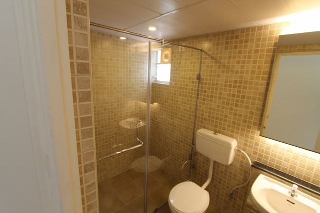 Bathroom with glass shower enclosure
